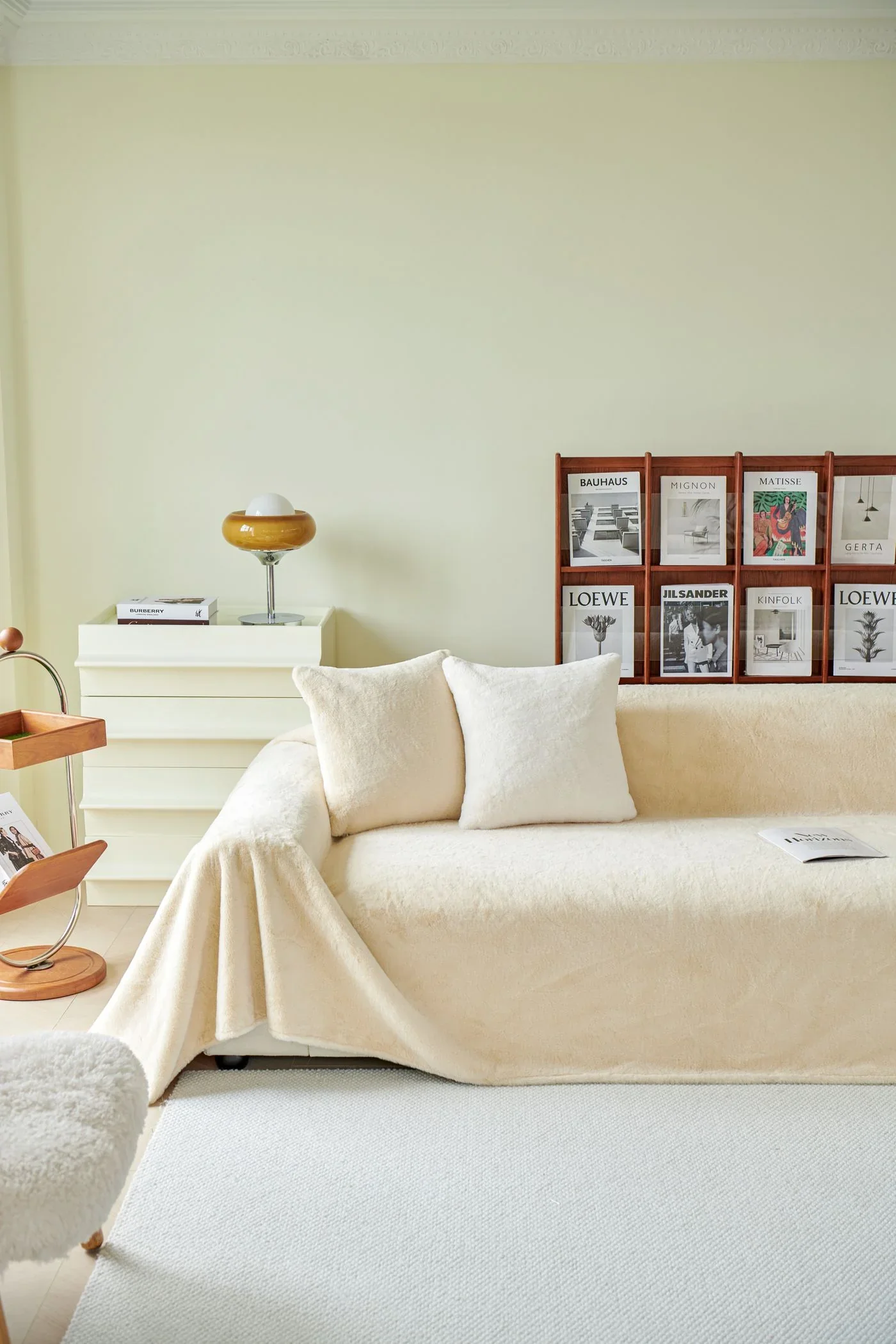 Cream three-seat sofa in a bright living room